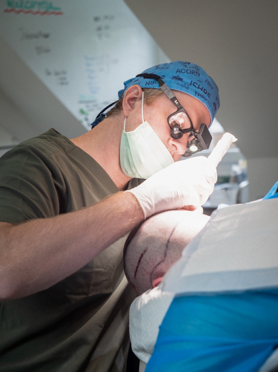 Dr Ted performing a hair restoration procedure